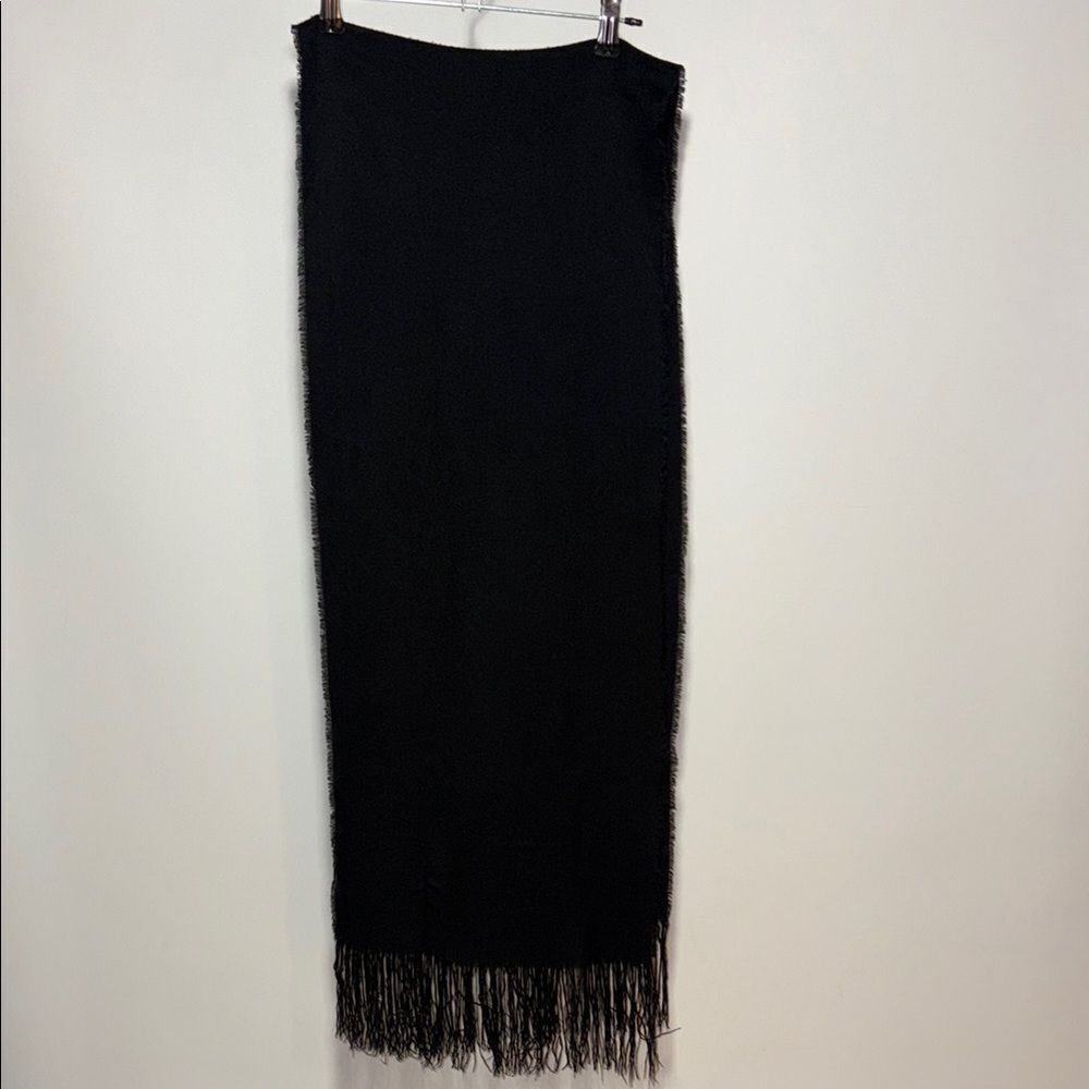 Plain black winter scarf with fringe on both ends.